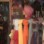 a rack of scarves and scarves for sale